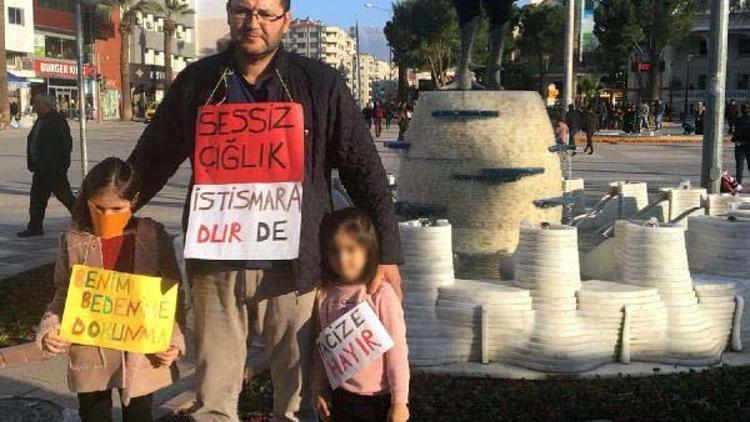 İki kızıyla taciz olaylarını protesto etti