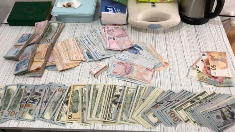 Gaybubet evinde 67 bin lira ve dolar, euro ele geçirildi