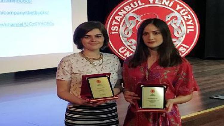 İstanbul Yeni Yüzyıl Üniversitesi’nin iki öğrencisine TÜGİAD’dan  ödül