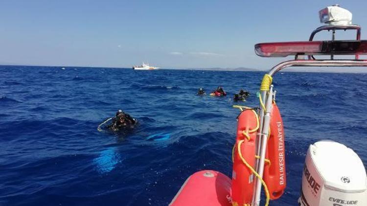 Ayvalıktaki tekne faciasında kaybolan 2 kişiyi arama çalışmaları sürüyor