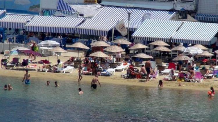 2 bin 500 kişinin yaşadığı adada 100 bin kişi tatil yapıyor
