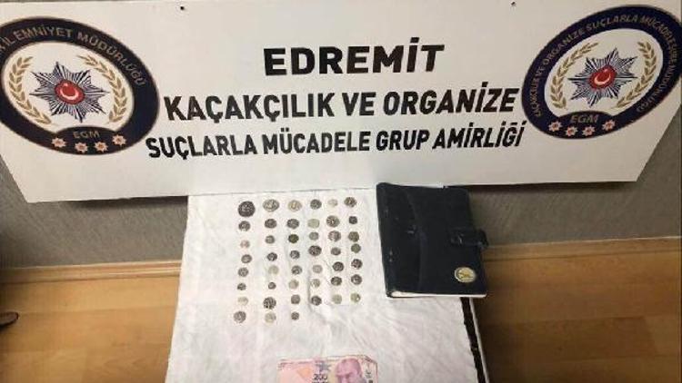 Edremitte emekli astsubaya sahte para gözaltısı