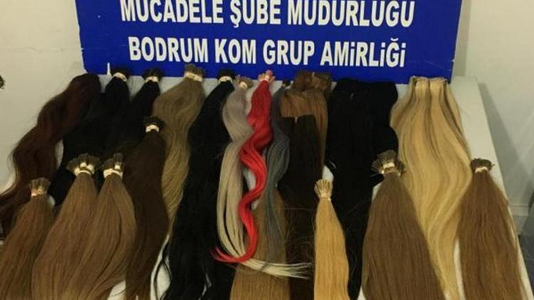 Kuaförlere gümrük kaçağı saç satmak isterken yakalandı