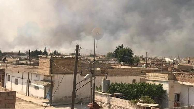 PKK/PYD’li teröristler buğday tarlasını yakıp, halay çekti