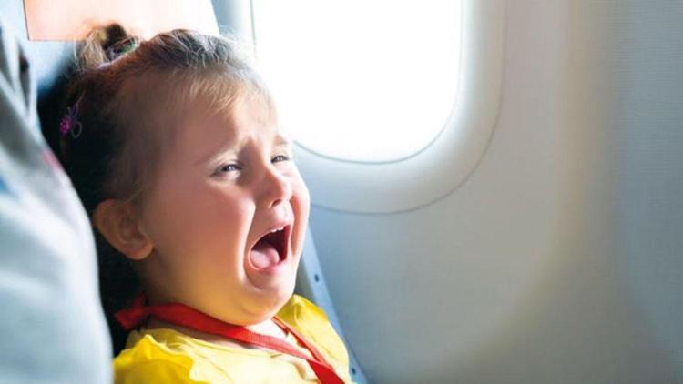 Uçakta bebeğe özel işaret