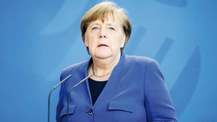 Merkel önlemleri gevşetme konusunda uyardı: Dikkatli olun