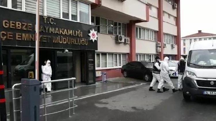 Maskeli gaspçılar, koruyucu kıyafetlerle adliyeye sevk edildi