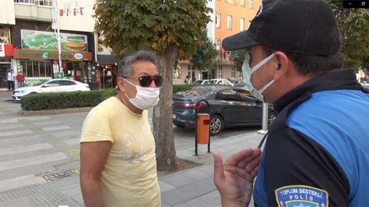 Maske takmadığı için ceza kesen polise beddua etti