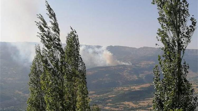 Ermenek’te, evde çıkan yangın ormana sıçradı