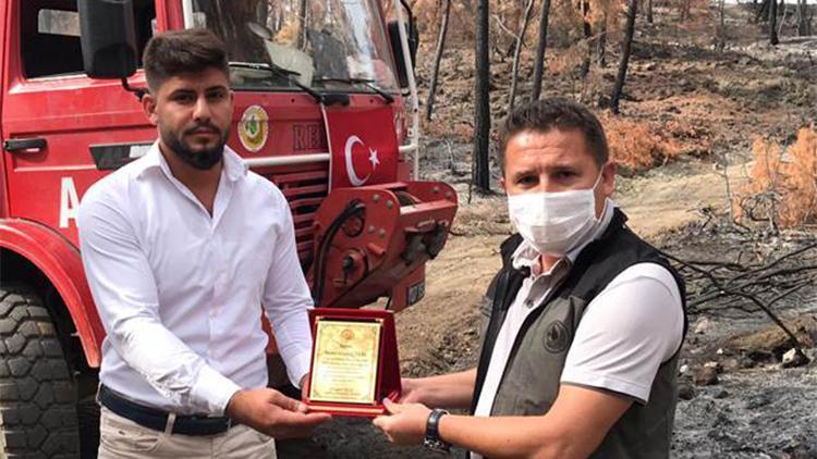 İki kardeşe, yangındaki çabaları için plaket