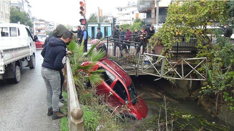 Kanala uçan otomobilden burnu bile kanamadan çıktı