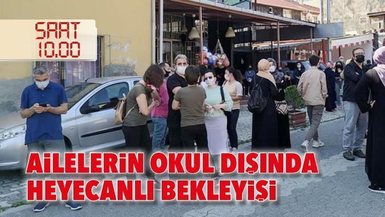 Ailelerin okul dışında heyecanlı bekleyişi