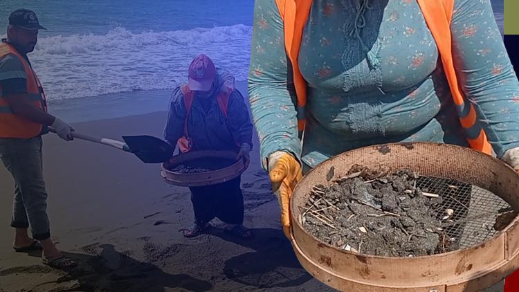 Samandağ sahilınde petrol atıkları elekle temizleniyor