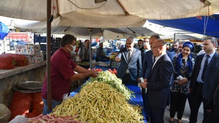 AK Parti Bursa İl Başkanı Gürkan, semt pazarında esnafla buluştu