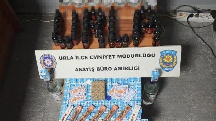 İzmirde markete kaçak sigara ve içki baskını