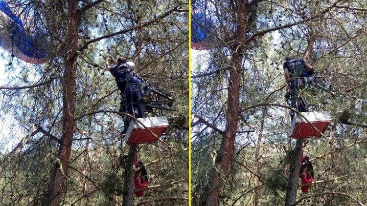 Ağaca asılı kalan amatör paraşütçü kurtarıldı