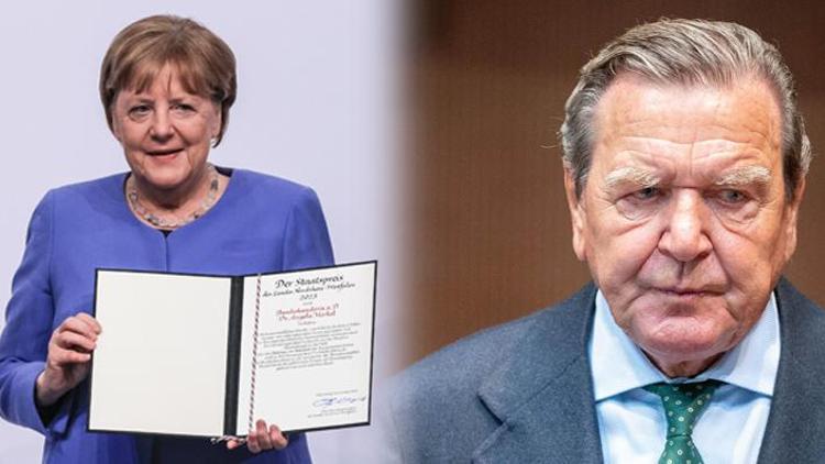 Merkel’e ödül, Schröder’e ceza