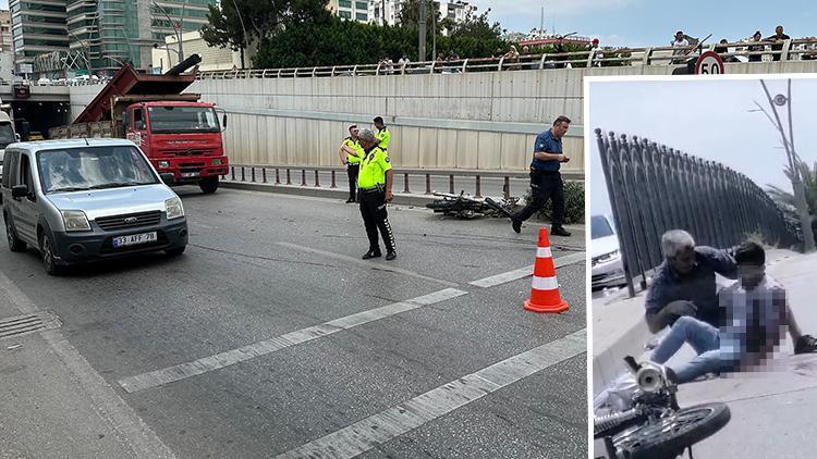 Adanada kamyon şoförü, aracına çarpan motosikletliyi hayatta tutmaya çalıştı