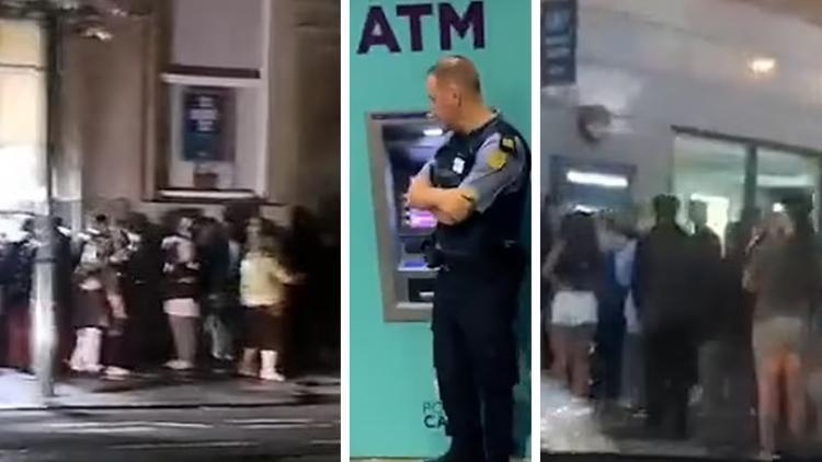 ATMler teknik arıza nedeni ile para dağıtmaya başladı Binlerce kişi kuyruk oldu, olaya polis müdahale etti...
