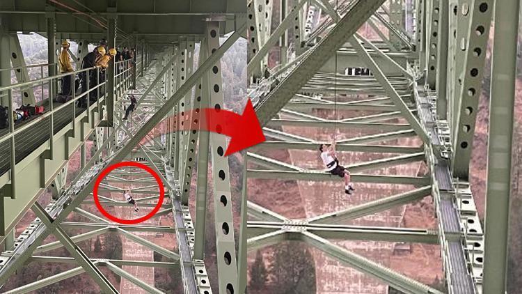 Video çekmek için çıktı, köprüde asılı kaldı