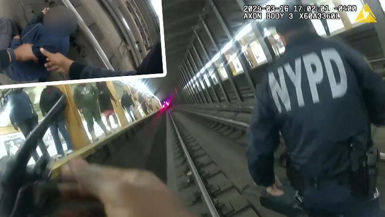 Metro raylarına düştü, polis son anda kurtardı