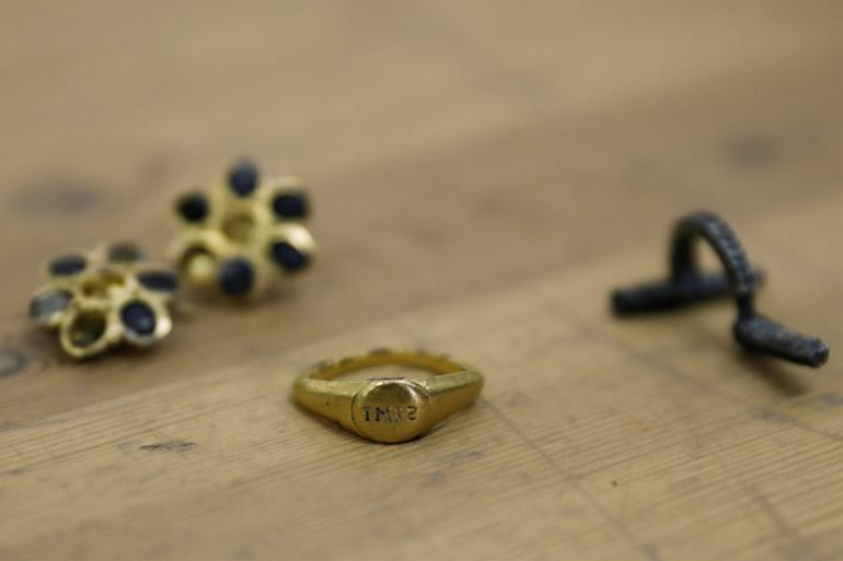 Sarcophagus with two skeletons and jewelry in ancient city