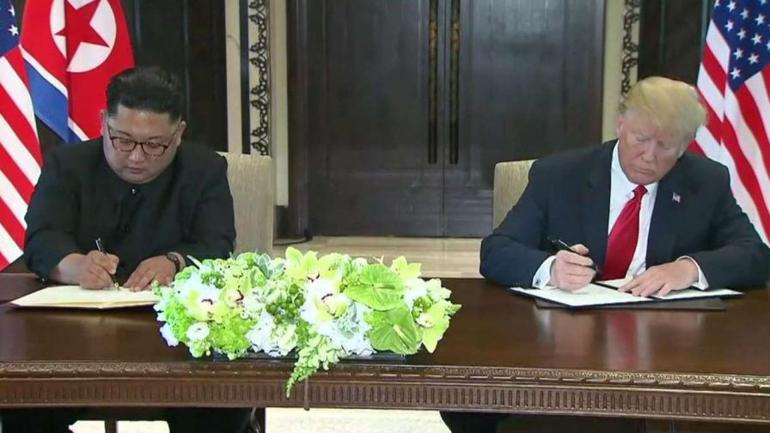 Trump, Kim sign comprehensive document