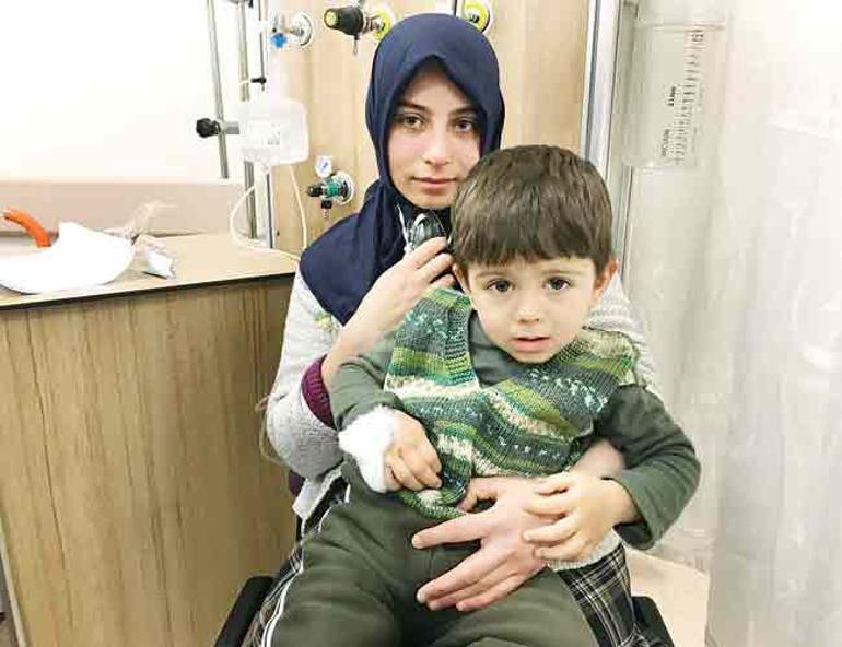 Mom throws her son from window to rescue him from fire