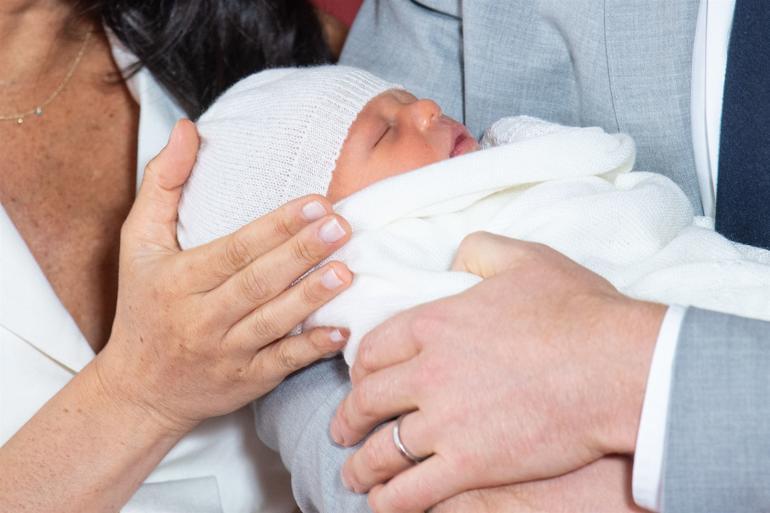Prince Harry and Meghan show baby son to the world