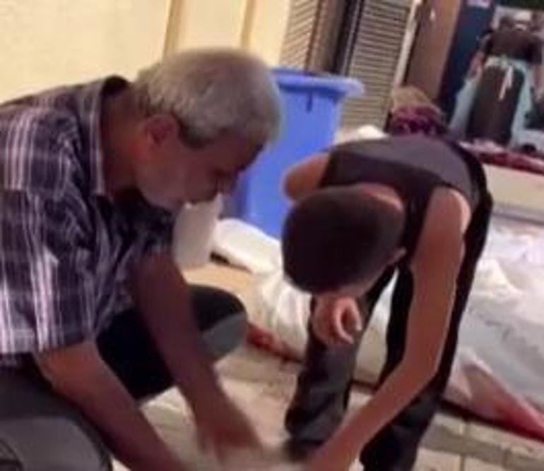 Gazzeden acı görüntüler... Filistinli çocuk cansız bedenler arasında ailesini aradı
