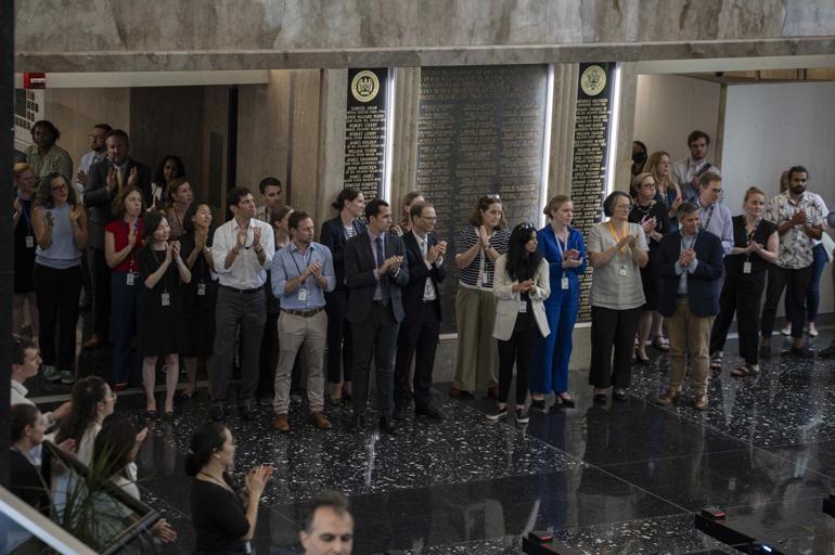 The US State Department laid off over 1,300 personnel.