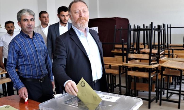 Political leaders cast votes in Turkey’s landmark twin elections