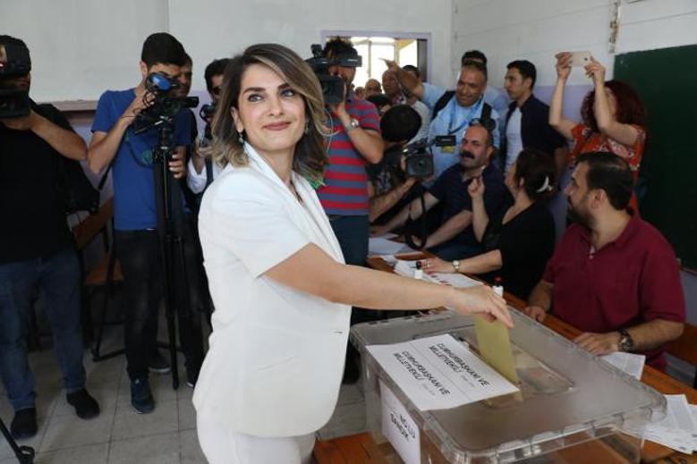 Political leaders cast votes in Turkey’s landmark twin elections