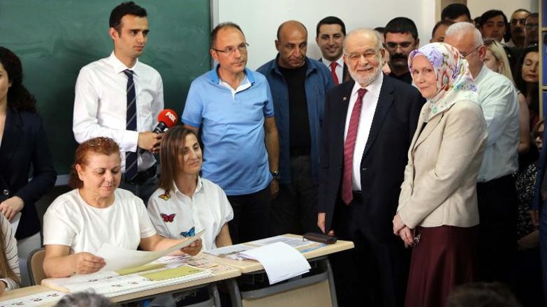 Political leaders cast votes in Turkey’s landmark twin elections
