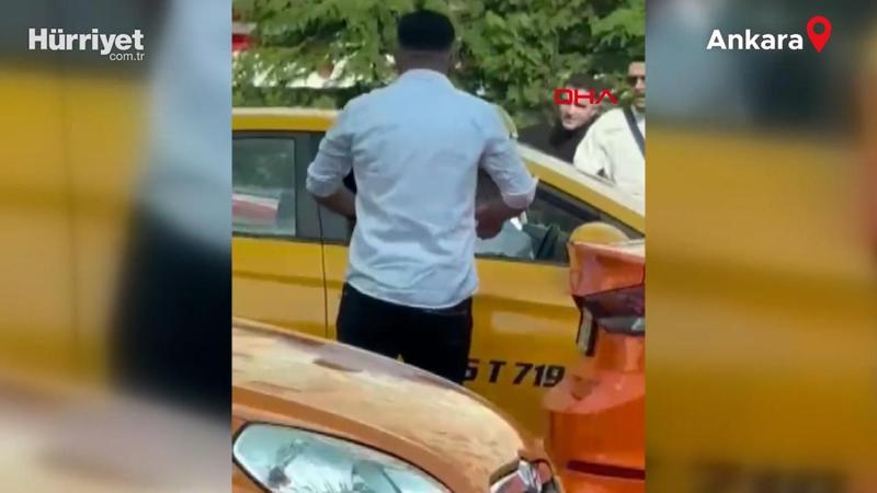 Trafikte tartıştığı taksi şoförünü yumrukladı; o anlar kamerada