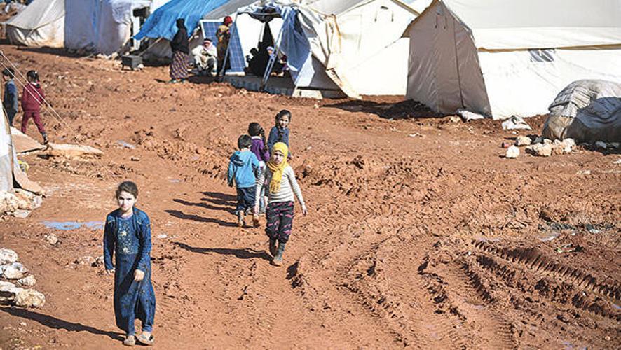People in Idlib pray for bad weather to prevent air strikes