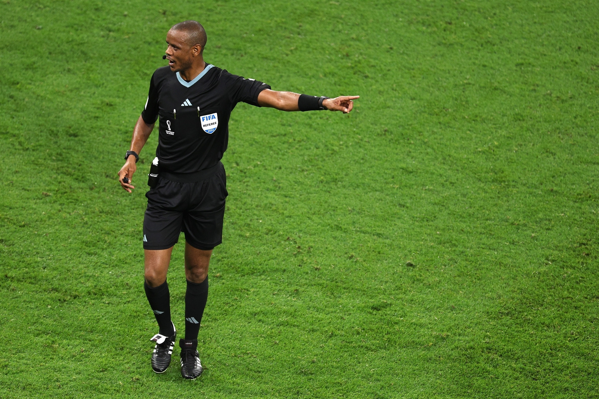 DOHA, QATAR - NOVEMBER 23: Referee Janny Sikazwe reacts during the FIFA World Cup Qatar 2022 Group F match between Belgium and Canada at Ahmad Bin Ali Stadium on November 23, 2022 in Doha, Qatar. (Photo by Richard Heathcote/Getty Images)