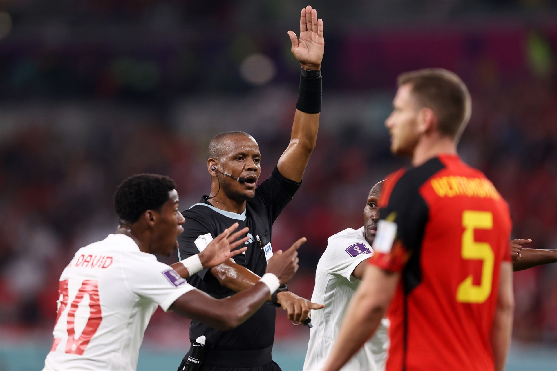 DOHA, QATAR - NOVEMBER 23: Referee Janny Sikazwe makes a call during the FIFA World Cup Qatar 2022 Group F match between Belgium and Canada at Ahmad Bin Ali Stadium on November 23, 2022 in Doha, Qatar. (Photo by Julian Finney/Getty Images)