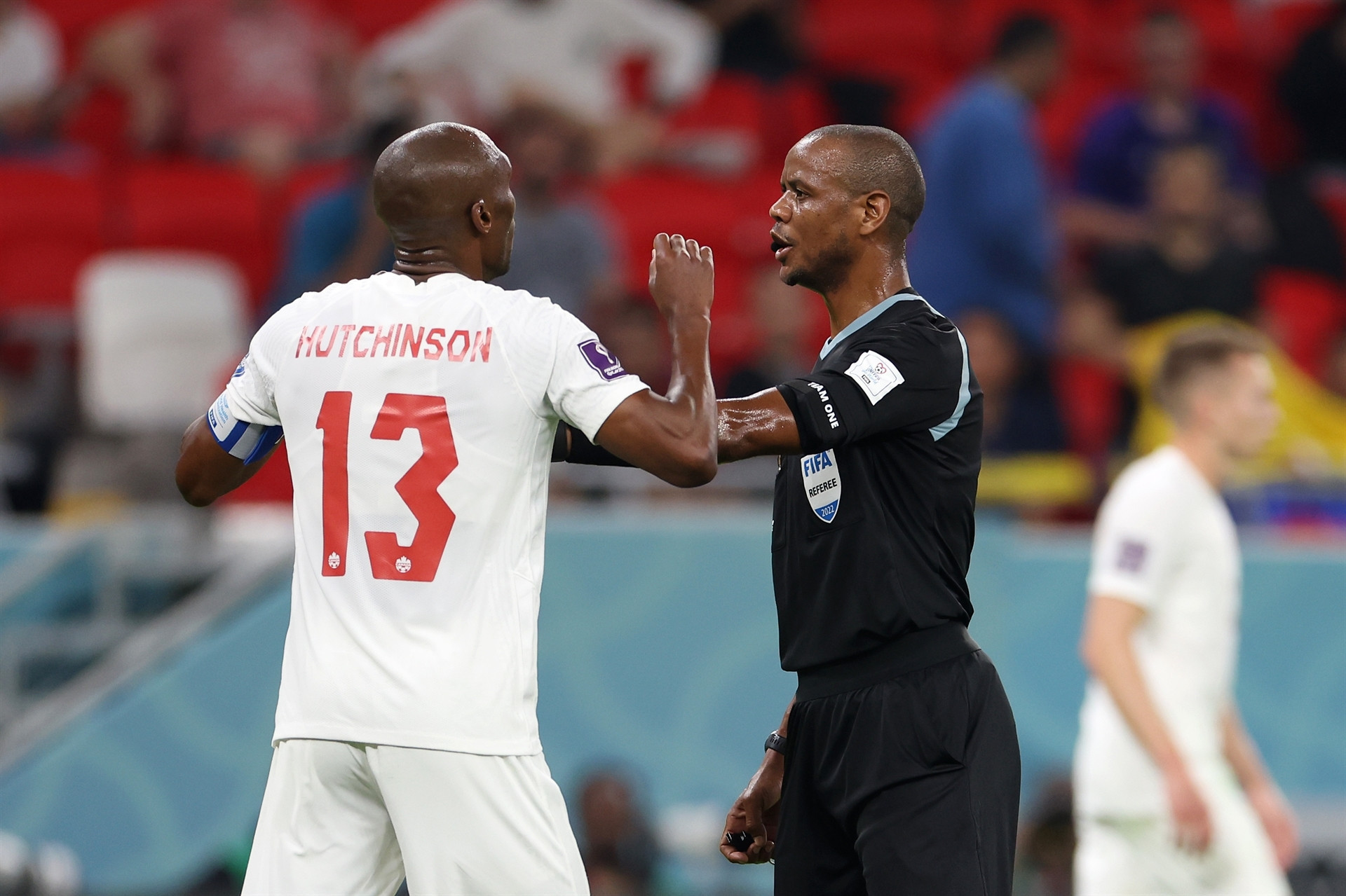 DOHA, QATAR - NOVEMBER 23: Atiba Hutchinson of Canada argues a call with referee Janny Sikazwe during the FIFA World Cup Qatar 2022 Group F match between Belgium and Canada at Ahmad Bin Ali Stadium on November 23, 2022 in Doha, Qatar. (Photo by Catherine Ivill/Getty Images)