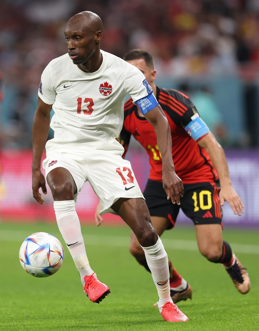 DOHA, QATAR - NOVEMBER 23: Atiba Hutchinson of Canada controls the ball against Eden Hazard of Belgium during the FIFA World Cup Qatar 2022 Group F match between Belgium and Canada at Ahmad Bin Ali Stadium on November 23, 2022 in Doha, Qatar. (Photo by Clive Brunskill/Getty Images)