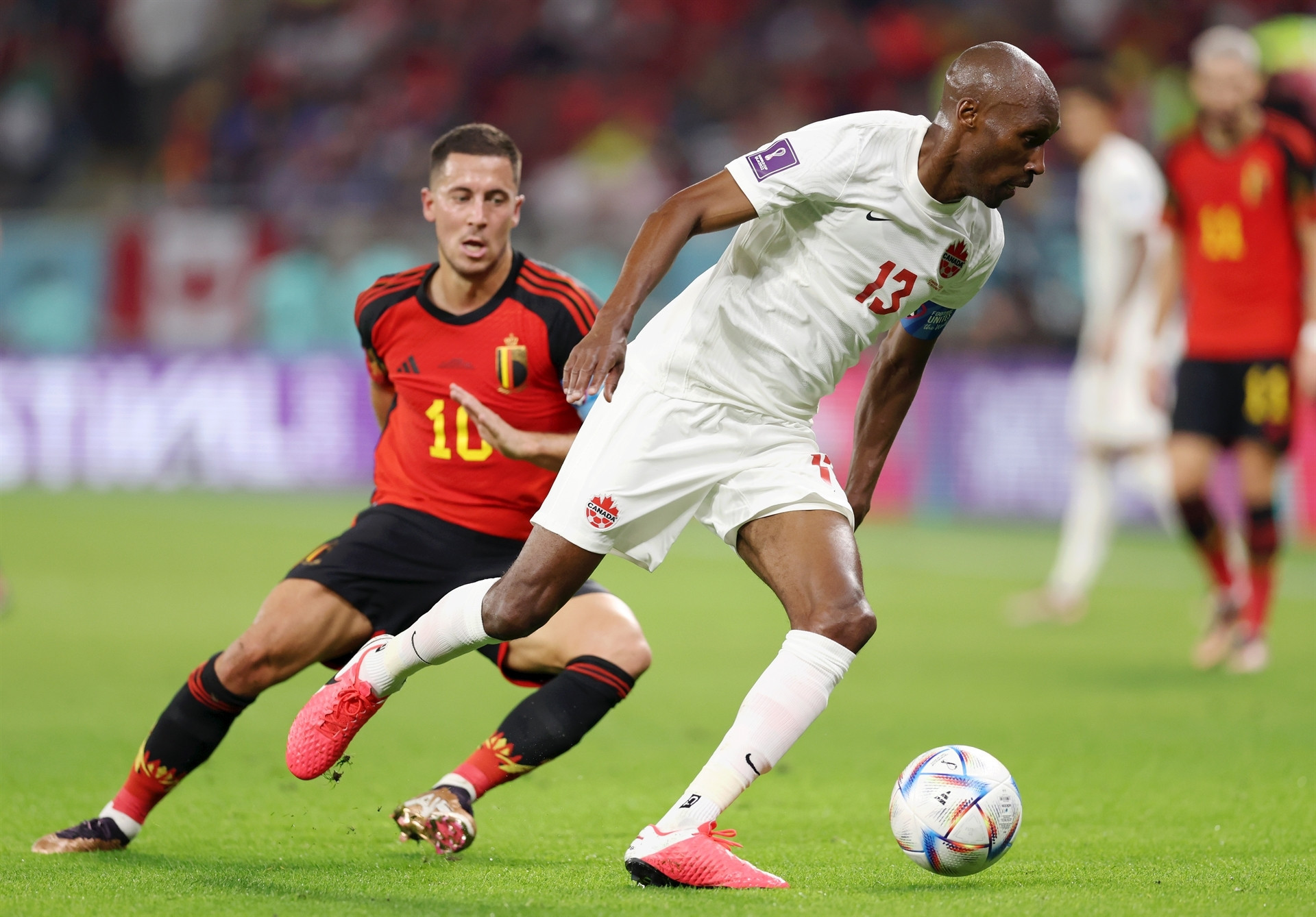 DOHA, QATAR - NOVEMBER 23: Atiba Hutchinson of Canada controls the ball against Eden Hazard of Belgium during the FIFA World Cup Qatar 2022 Group F match between Belgium and Canada at Ahmad Bin Ali Stadium on November 23, 2022 in Doha, Qatar. (Photo by Clive Brunskill/Getty Images)