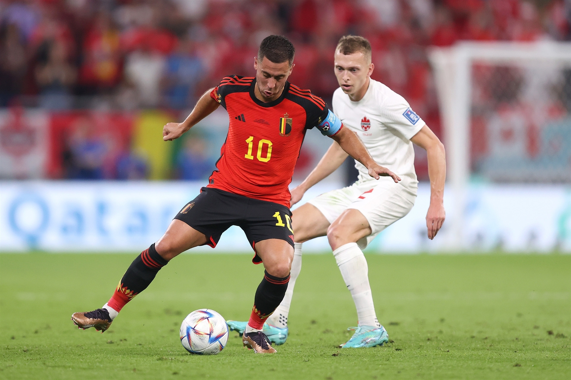 DOHA, QATAR - NOVEMBER 23: Eden Hazard of Belgium controls the ball against Alistair Johnston of Canada during the FIFA World Cup Qatar 2022 Group F match between Belgium and Canada at Ahmad Bin Ali Stadium on November 23, 2022 in Doha, Qatar. (Photo by Julian Finney/Getty Images)