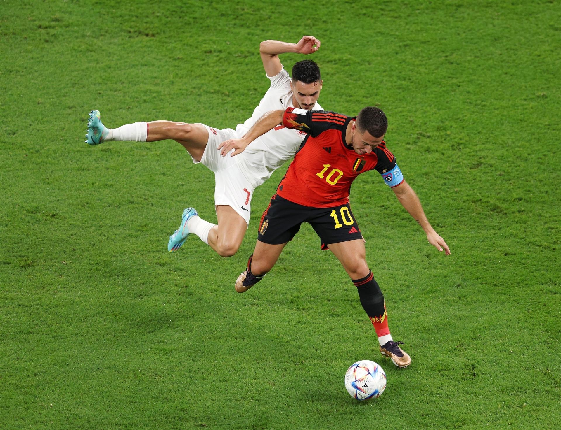 DOHA, QATAR - NOVEMBER 23: Eden Hazard of Belgium controls the ball against Stephen Eustaquio of Canada during the FIFA World Cup Qatar 2022 Group F match between Belgium and Canada at Ahmad Bin Ali Stadium on November 23, 2022 in Doha, Qatar. (Photo by Richard Heathcote/Getty Images)