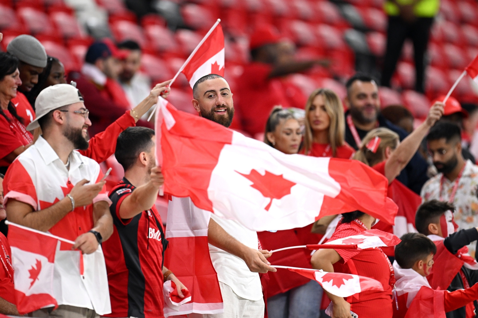 DOHA, QATAR - NOVEMBER 23: Canada fans show their support prior to the FIFA World Cup Qatar 2022 Group F match between Belgium and Canada at Ahmad Bin Ali Stadium on November 23, 2022 in Doha, Qatar. (Photo by Matthias Hangst/Getty Images)