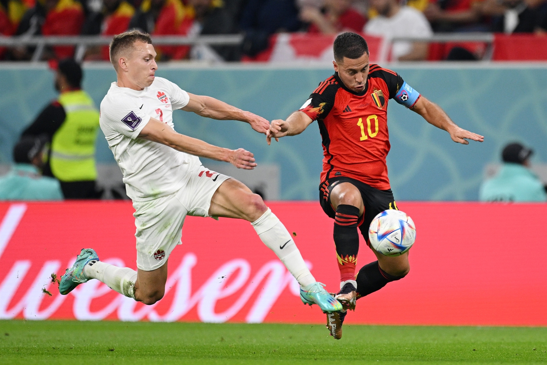 DOHA, QATAR - NOVEMBER 23: Eden Hazard of Belgium battles for possession with Alistair Johnston of Canada during the FIFA World Cup Qatar 2022 Group F match between Belgium and Canada at Ahmad Bin Ali Stadium on November 23, 2022 in Doha, Qatar. (Photo by Matthias Hangst/Getty Images)