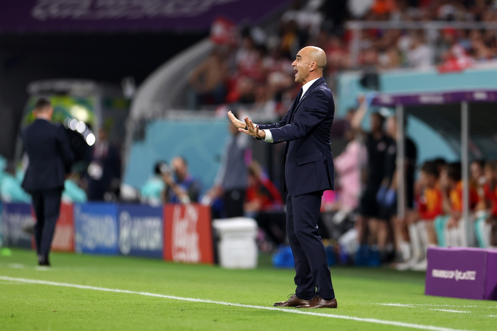 DOHA, QATAR - NOVEMBER 23: Roberto Martinez, Head Coach of Belgium, gives their team instructions during the FIFA World Cup Qatar 2022 Group F match between Belgium and Canada at Ahmad Bin Ali Stadium on November 23, 2022 in Doha, Qatar. (Photo by Catherine Ivill/Getty Images)