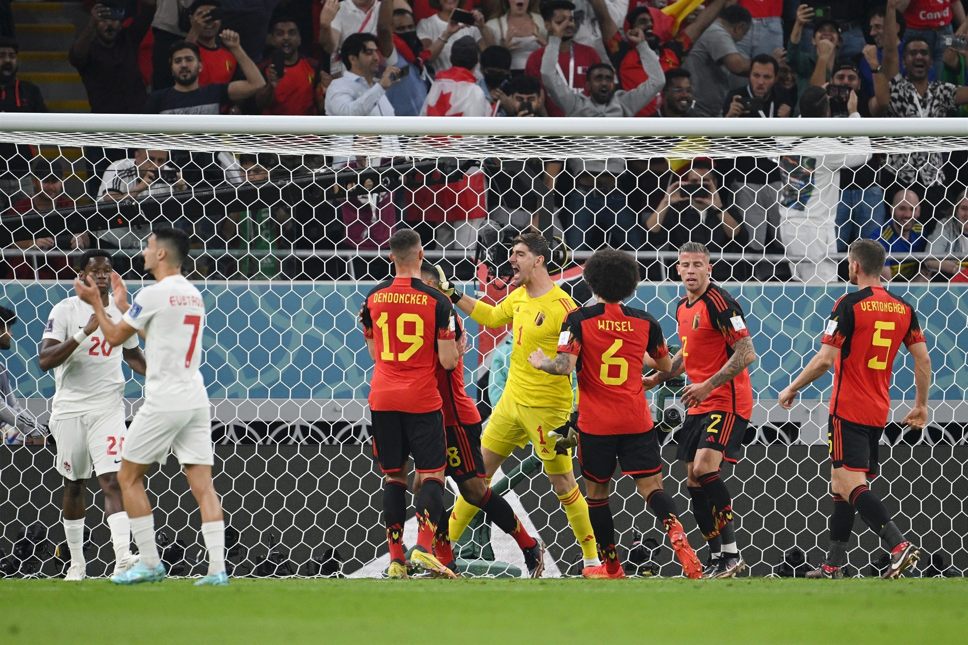 DOHA, QATAR - NOVEMBER 23: Thibaut Courtois of Belgium celebrates after saving the penalty taken by Alphonso Davies (not pictured) of Canada during the FIFA World Cup Qatar 2022 Group F match between Belgium and Canada at Ahmad Bin Ali Stadium on November 23, 2022 in Doha, Qatar. (Photo by Matthias Hangst/Getty Images)