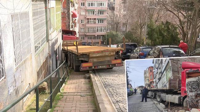 Beşiktaş'ta faciadan dönüldü: Yokuştan kayan TIR binanın duvarına çarptı