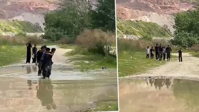 Derenin su seviyesi yükselince mahsur kaldılar: İtfaiyeciler sırtlarında taşıyıp kurtardı