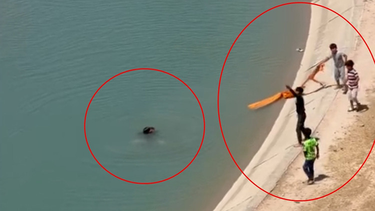 Batman’da ilginç görüntüler! Akıntıya kapılan 2 kişiyi halat ve çekpasla kurtardılar